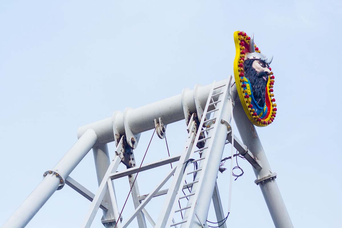 coaster low angle photography of circus ride roller coaster